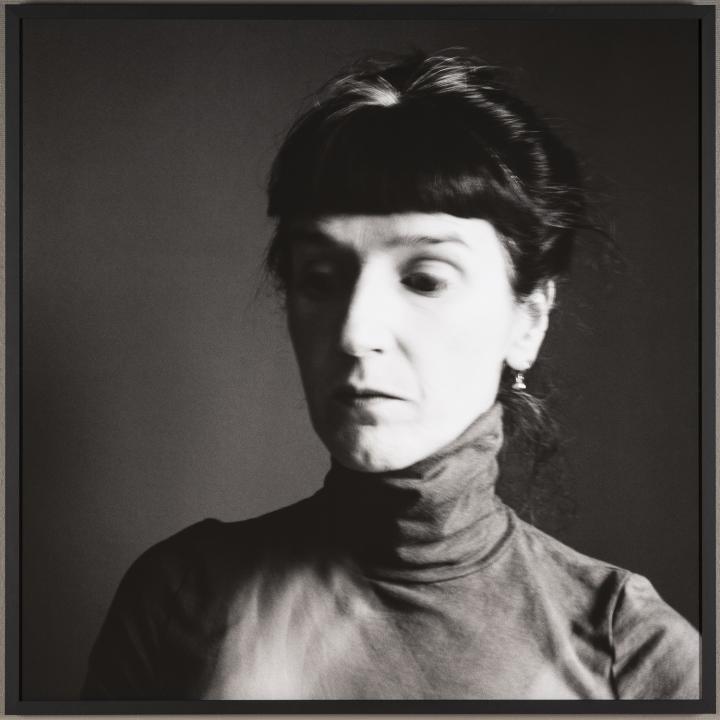 Self-portrait with blurred hands